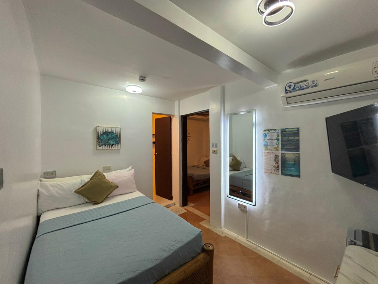 double bed and a door