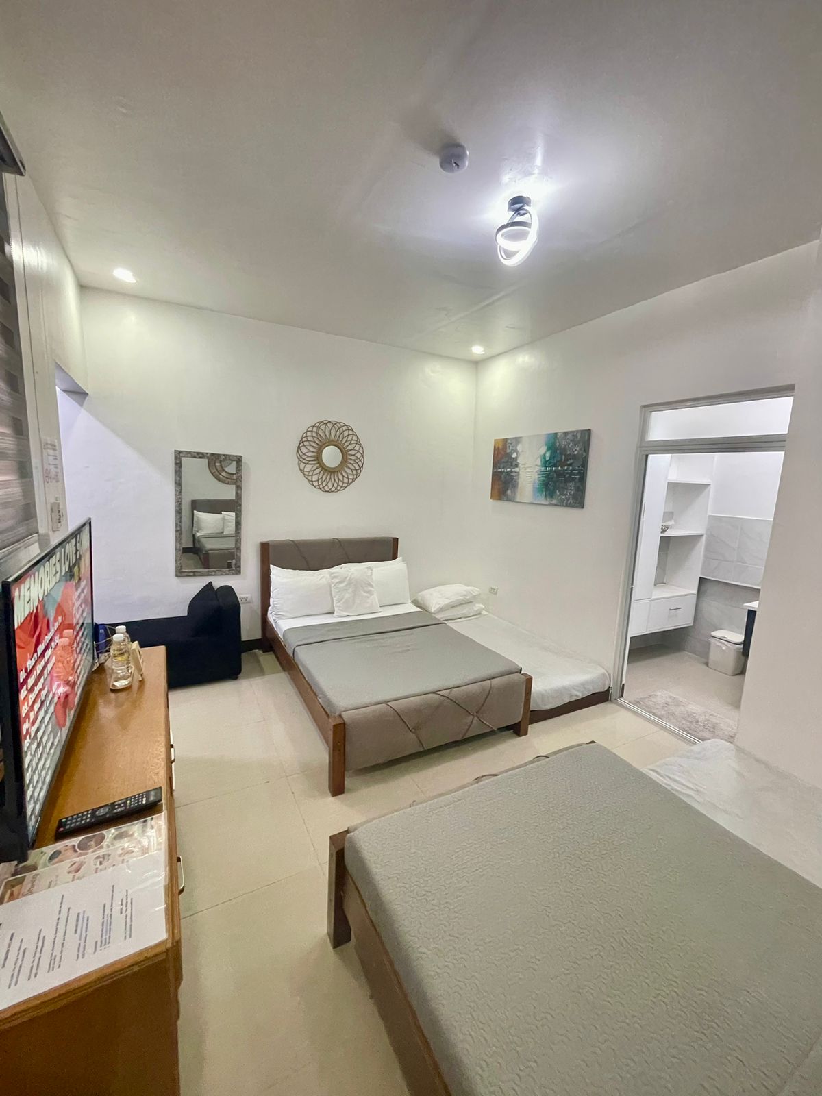 three beds in the room